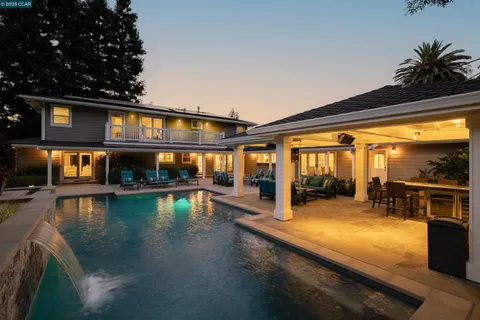 a view of a swimming pool and sitting space