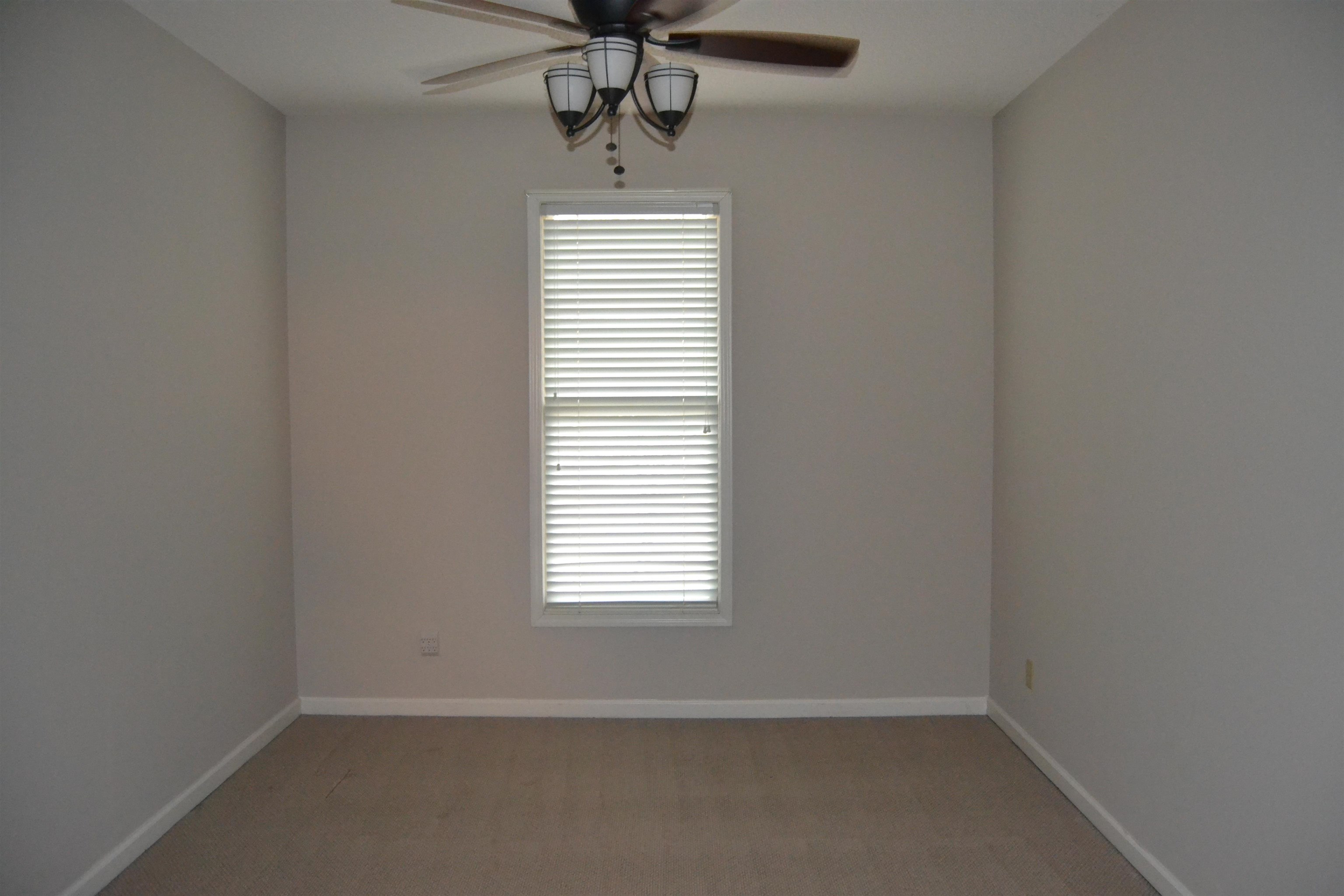 10486 Juneau Way Collierville, TN 38017 - Photo 25 of 33 Carpeted spare room featuring ceiling fan