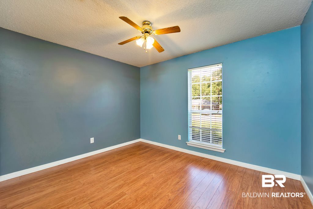 9385 Prairie Drive Semmes, AL 36575 - Photo 12 of 19 3 total bedrooms/ all have Pergo wood flooring