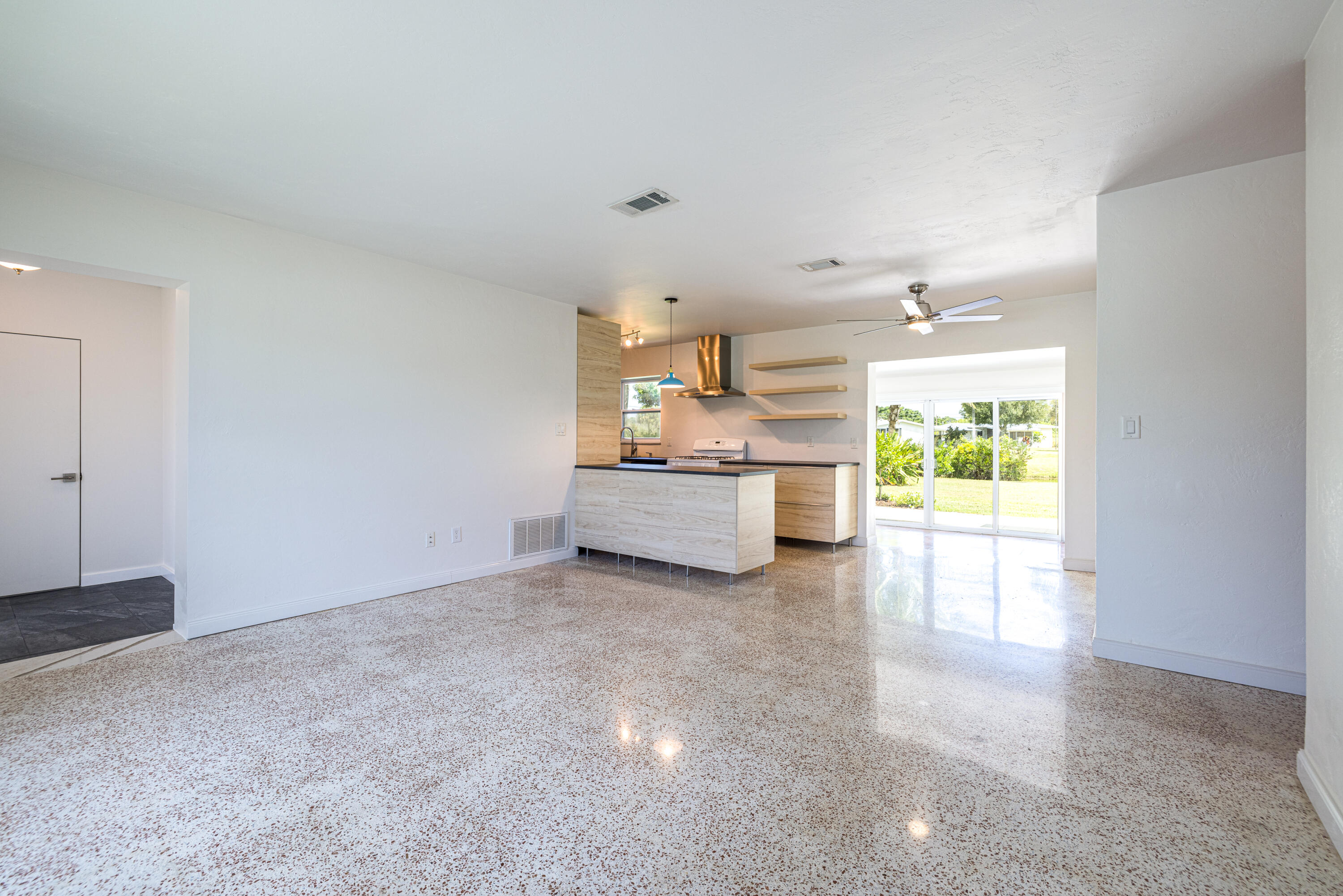 2805 Southeast Pocatella Road Port St. Lucie, FL 34952 - Photo 3 of 34 Entry Living Kitchen
