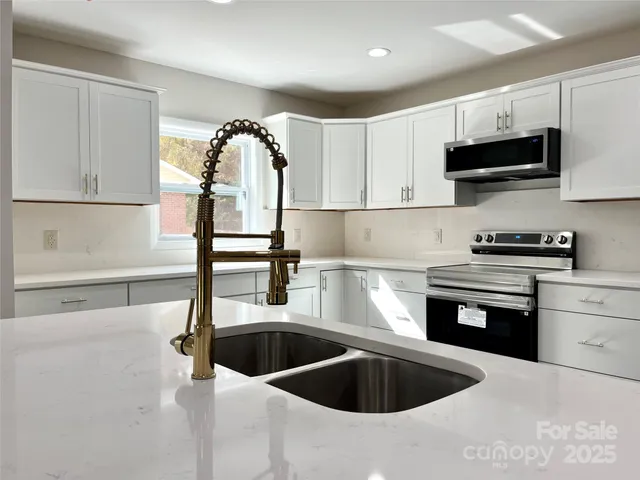 a living room with a fireplace and a table