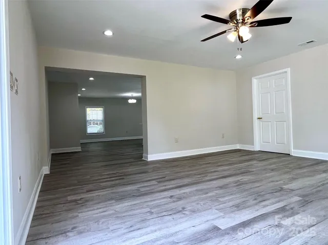 a view of balcony with deck and wooden floor