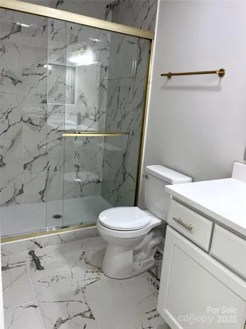 a view of a house with swimming pool and a yard