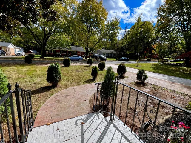 a view of kitchen with wooden floor and window
