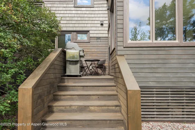 a view of a chair in the balcony