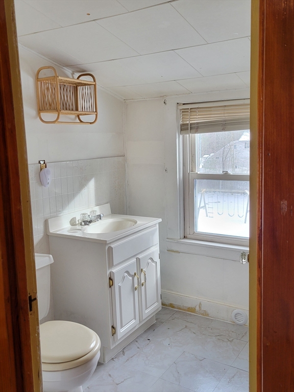 383 State Road Templeton, MA 01436 - Photo 20 of 36 a bathroom with a sink a toilet and a window