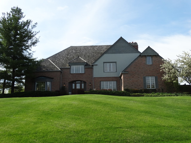 a front view of house with yard