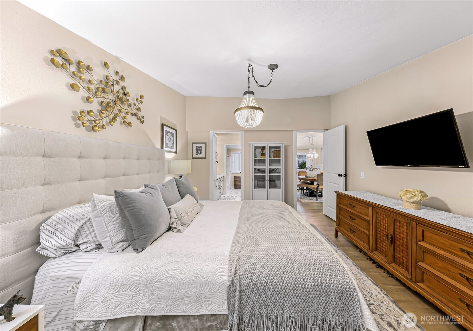 1014 West Smith Road, Unit 36 Bellingham, WA 98226 - Photo 12 of 32 a bedroom with a bed and a flat screen tv