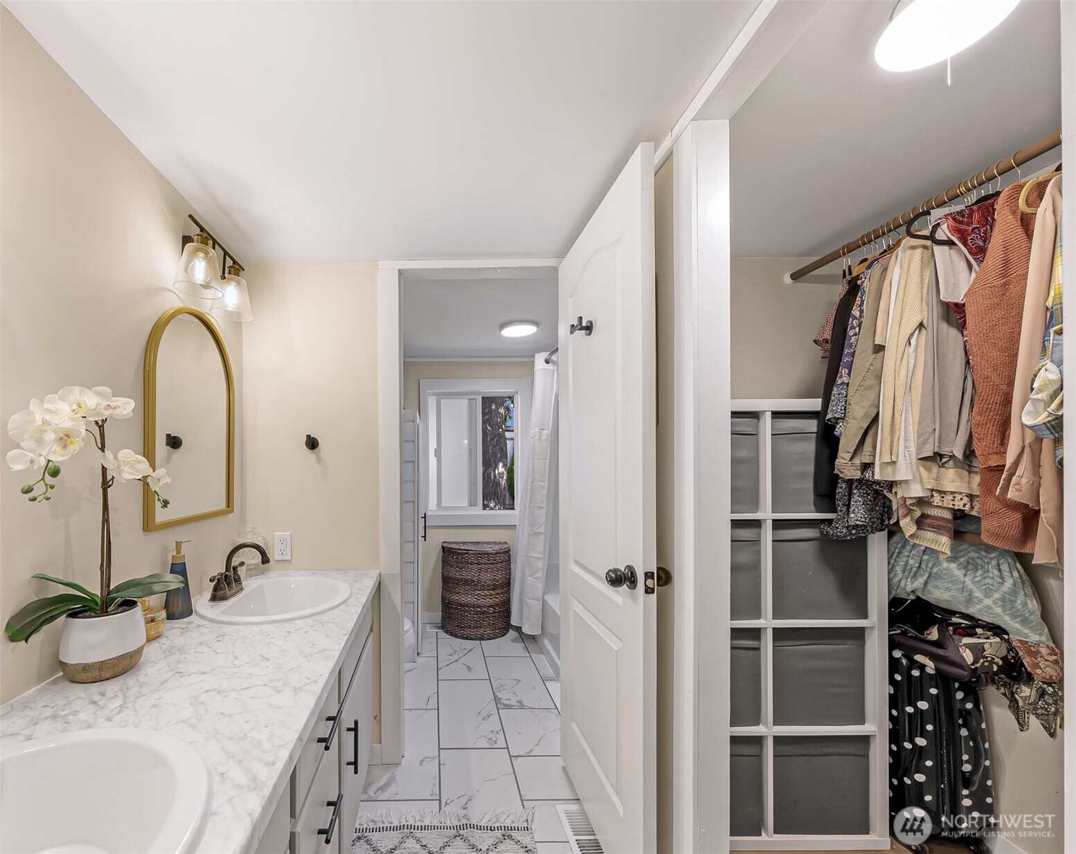 1014 West Smith Road, Unit 36 Bellingham, WA 98226 - Photo 14 of 32 a bathroom with a double vanity sink a mirror and shower
