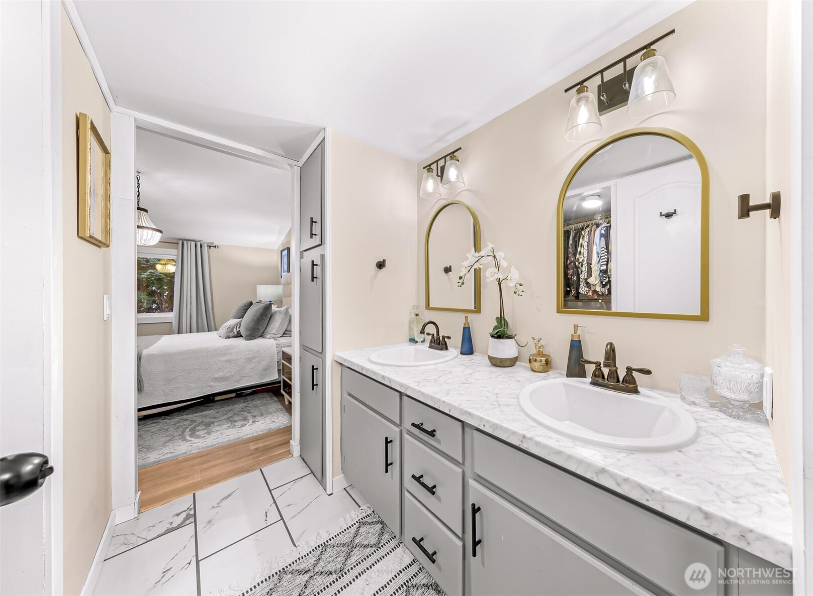 1014 West Smith Road, Unit 36 Bellingham, WA 98226 - Photo 16 of 32 a en suite bathroom with a granite countertop sink and a mirror