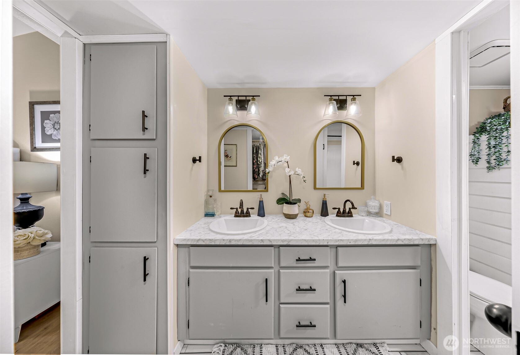 1014 West Smith Road, Unit 36 Bellingham, WA 98226 - Photo 17 of 32 a en suite bathroom with a granite countertop sink and a mirror