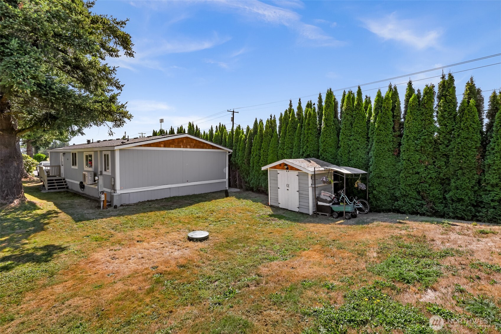 1014 West Smith Road, Unit 36 Bellingham, WA 98226 - Photo 31 of 32 a view of a house with backyard and sitting area