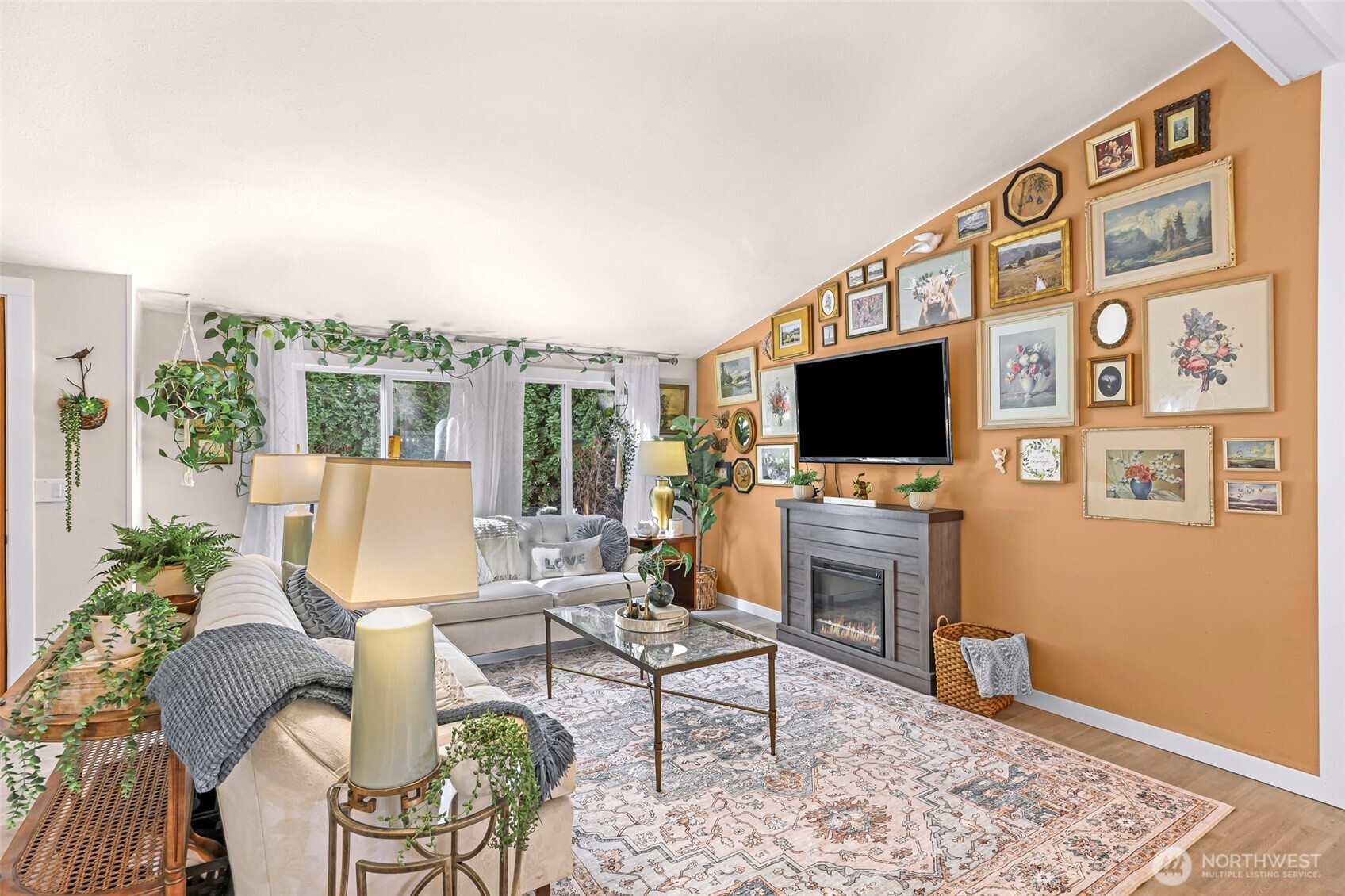 1014 West Smith Road, Unit 36 Bellingham, WA 98226 - Photo 4 of 32 a living room with furniture fireplace and flat screen tv