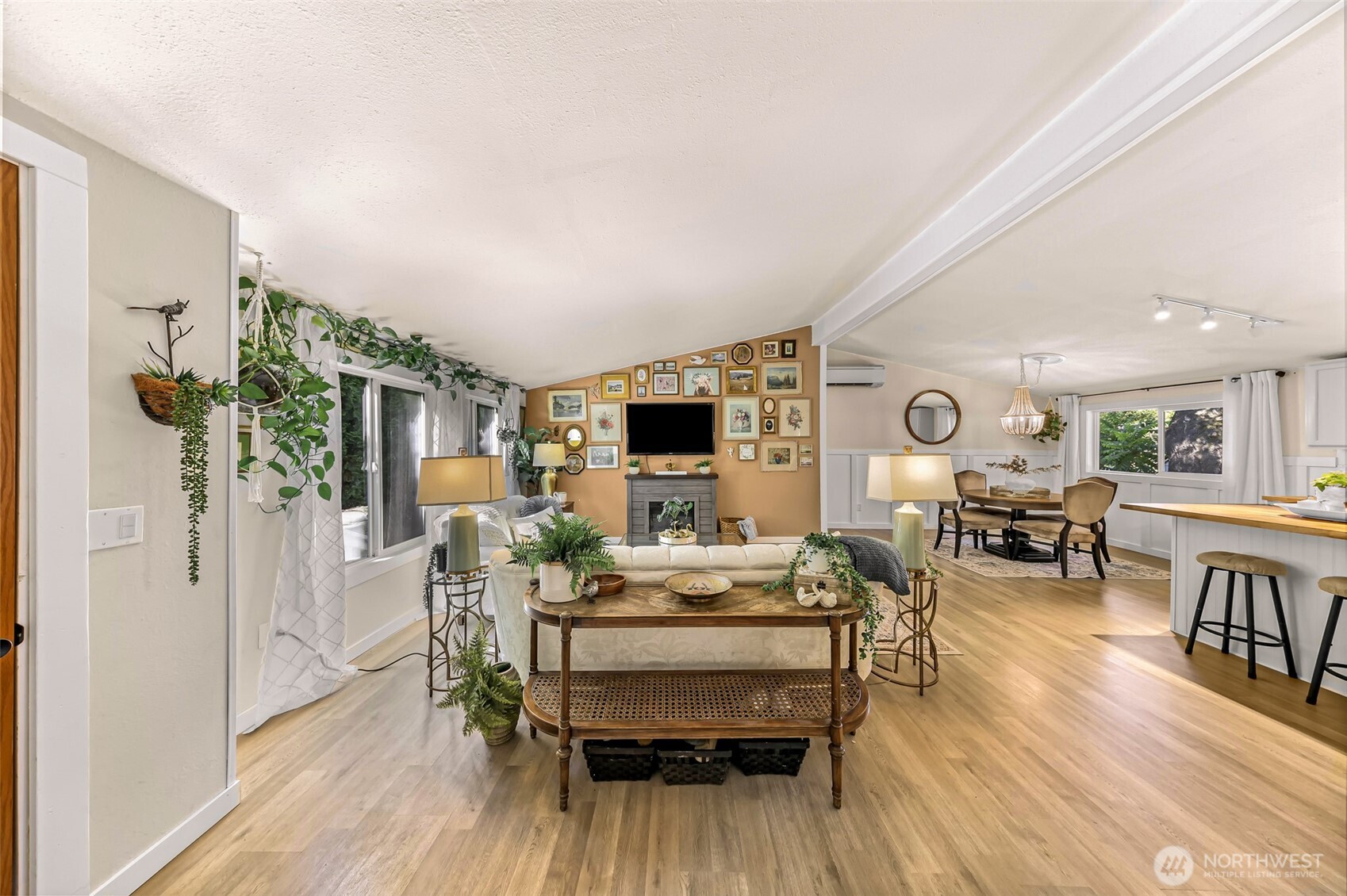 1014 West Smith Road, Unit 36 Bellingham, WA 98226 - Photo 5 of 32 a living room with furniture and a wooden floor