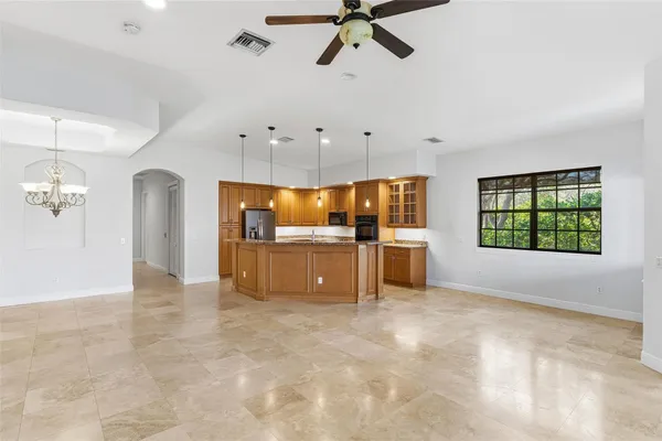 a view of a kitchen with a sink and cabinet area