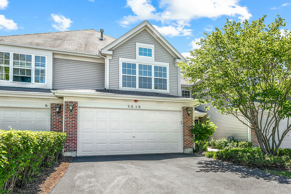 3058 Crystal Rock Road, Unit 3058 Naperville, IL 60564 - Photo 1 of 21 a view of a house with a garage