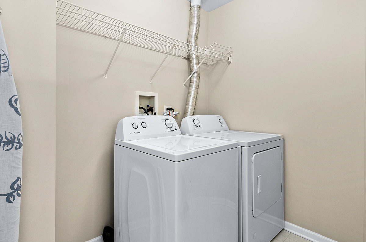 3058 Crystal Rock Road, Unit 3058 Naperville, IL 60564 - Photo 16 of 21 a utility room with dryer and washer