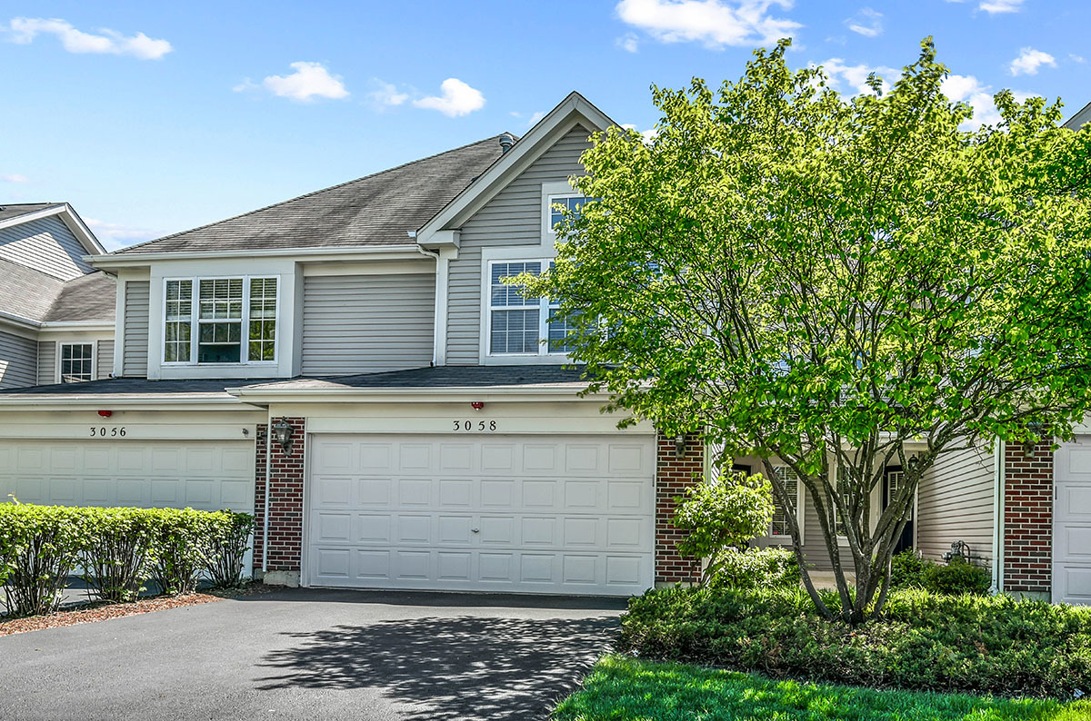3058 Crystal Rock Road, Unit 3058 Naperville, IL 60564 - Photo 21 of 21 a view of a house with a tree