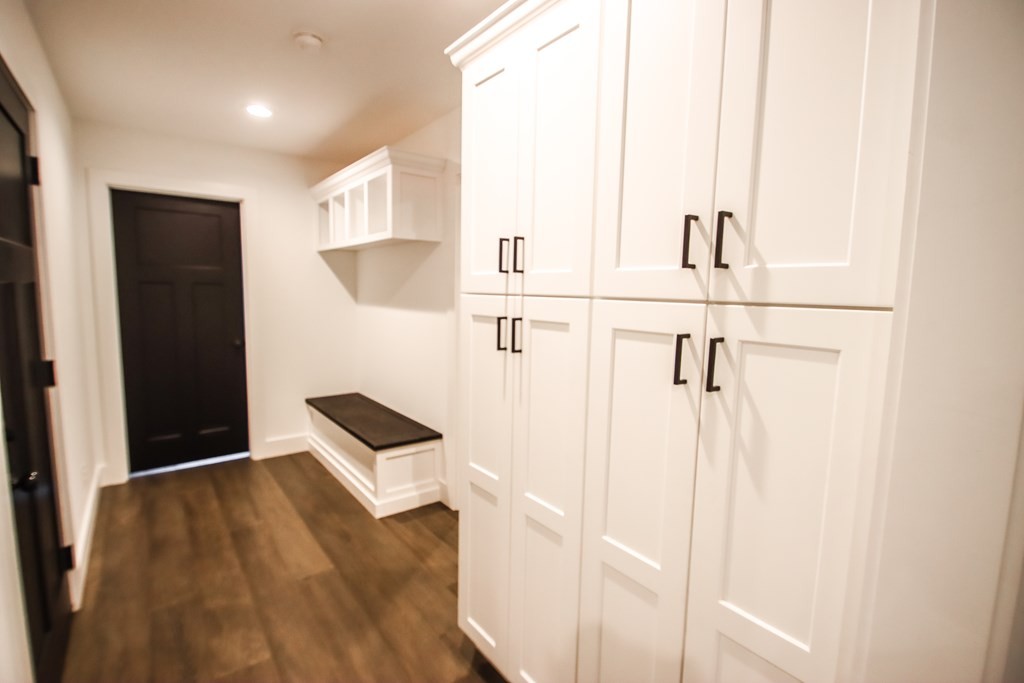 191 Rustling Oaks Drive Sparta, TN 38583 - Photo 12 of 20 a view of a kitchen with wooden floor and staircase