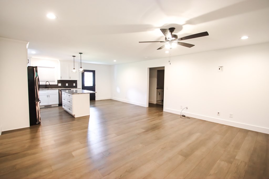 191 Rustling Oaks Drive Sparta, TN 38583 - Photo 7 of 20 a view of a kitchen with a sink and a refrigerator