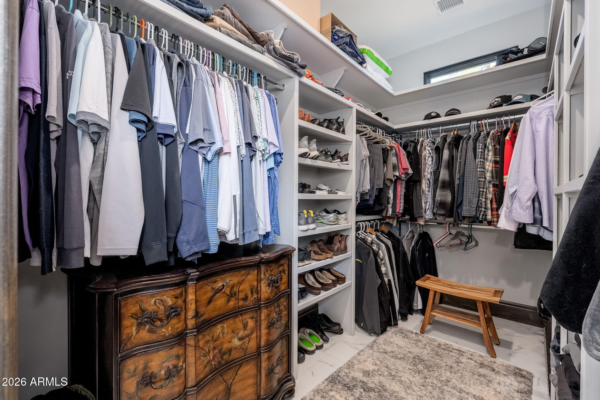 602 North Redbud Circle Payson, AZ 85541 - Photo 29 of 83 a view of walk in closet with clothes and shoes