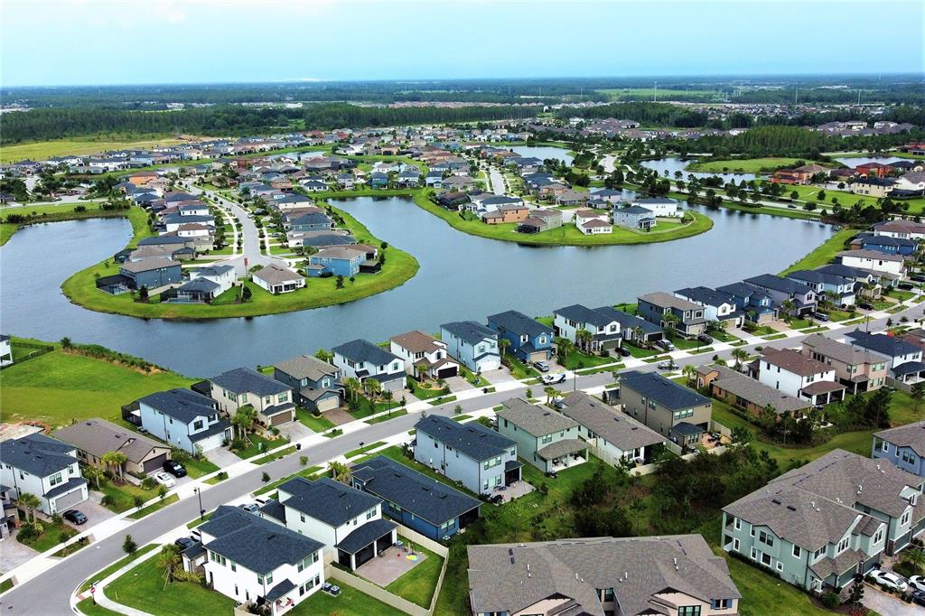 4709 Ancona Way Wesley Chapel, FL 33543 - Photo 26 of 52 an aerial view of a house with outdoor space