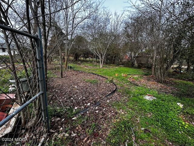 180 Logtown Road Yatesville, GA 31097 - Photo 25 of 32 fenced garden area with patio