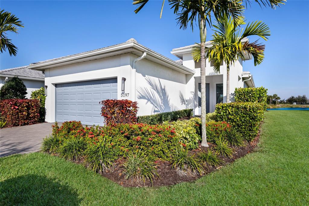 5197 Barnett Circle Lakewood Ranch, FL 34211 - Photo 1 of 1 a view of a house with a yard
