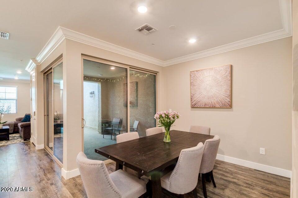3855 South McQueen Road, Unit 14 Chandler, AZ 85286 - Photo 13 of 31 a view of a dining room with furniture