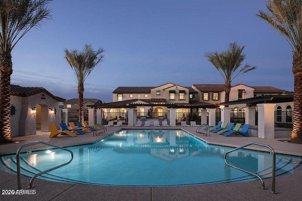 3855 South McQueen Road, Unit 14 Chandler, AZ 85286 - Photo 29 of 31 a view of a house with swimming pool