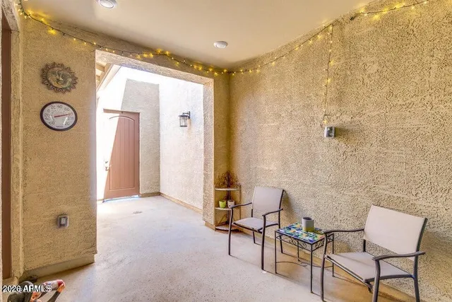 a view of a elevator with wooden door