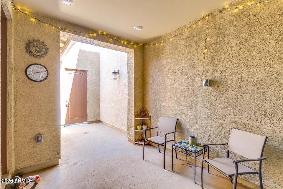 3855 South McQueen Road, Unit 14 Chandler, AZ 85286 - Photo 3 of 31 a view of a elevator with wooden door