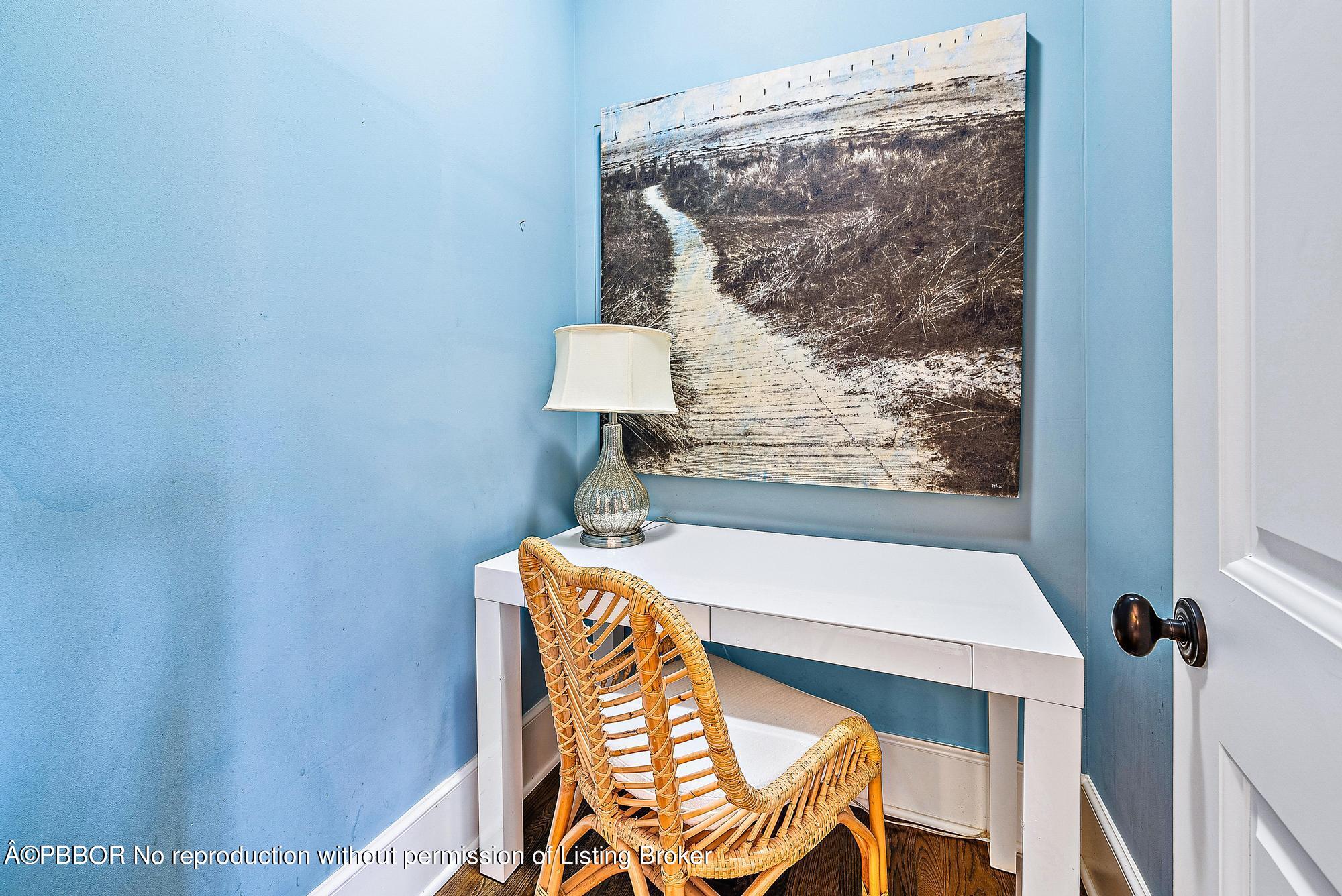 165 Root Trail Palm Beach, FL 33480 - Photo 19 of 26 a view of a room with a table and chairs