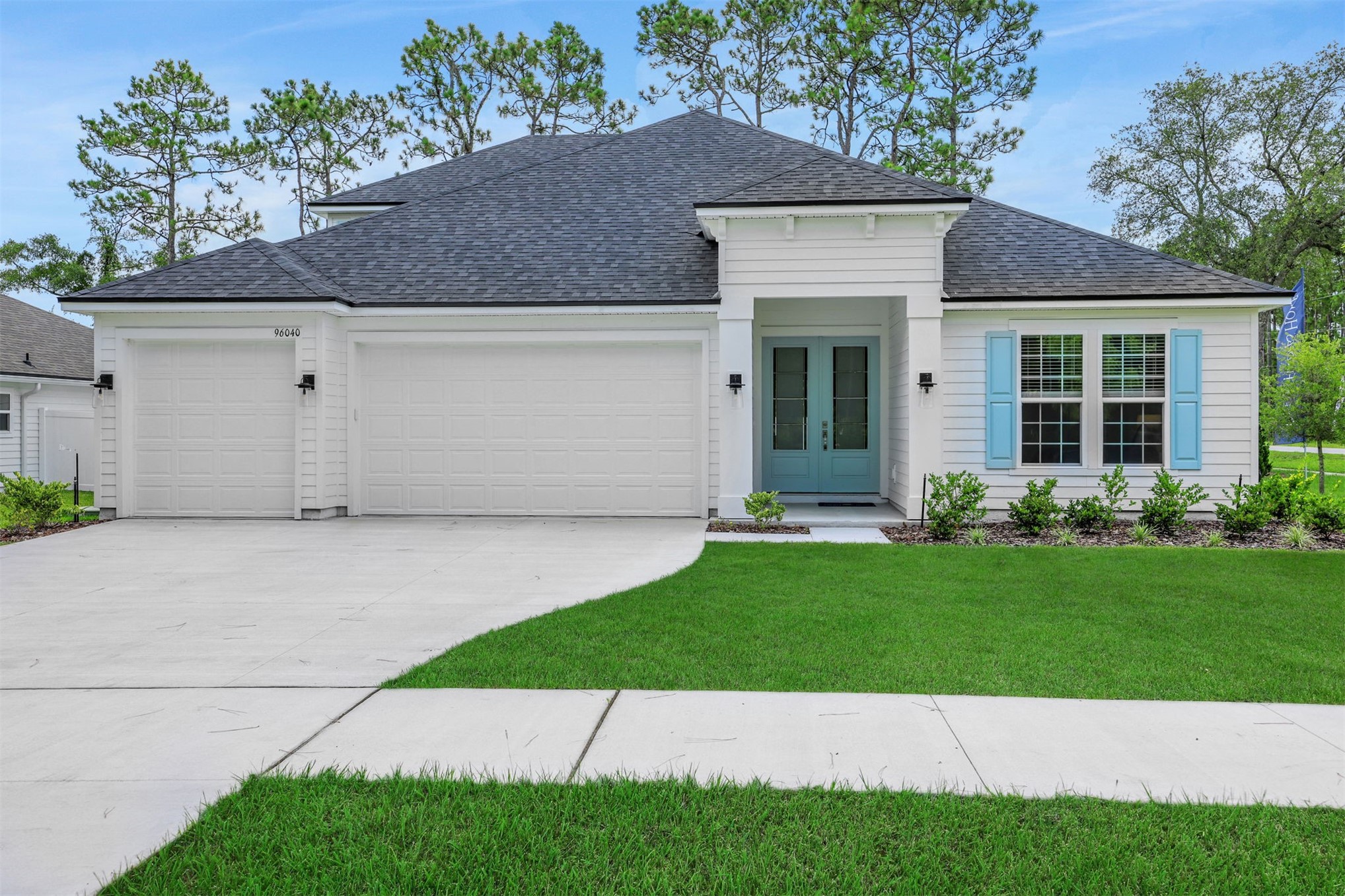 96040 Pirates Bluff Road Yulee, FL 32097 - Photo 1 of 38 a view of a house with a yard