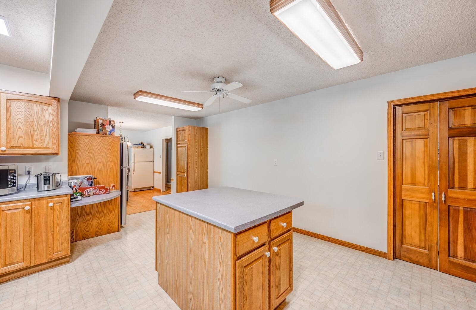 8651 Baylor Road Bartlett, TN 38002 - Photo 7 of 29 a view of a kitchen cabinets and a appliances