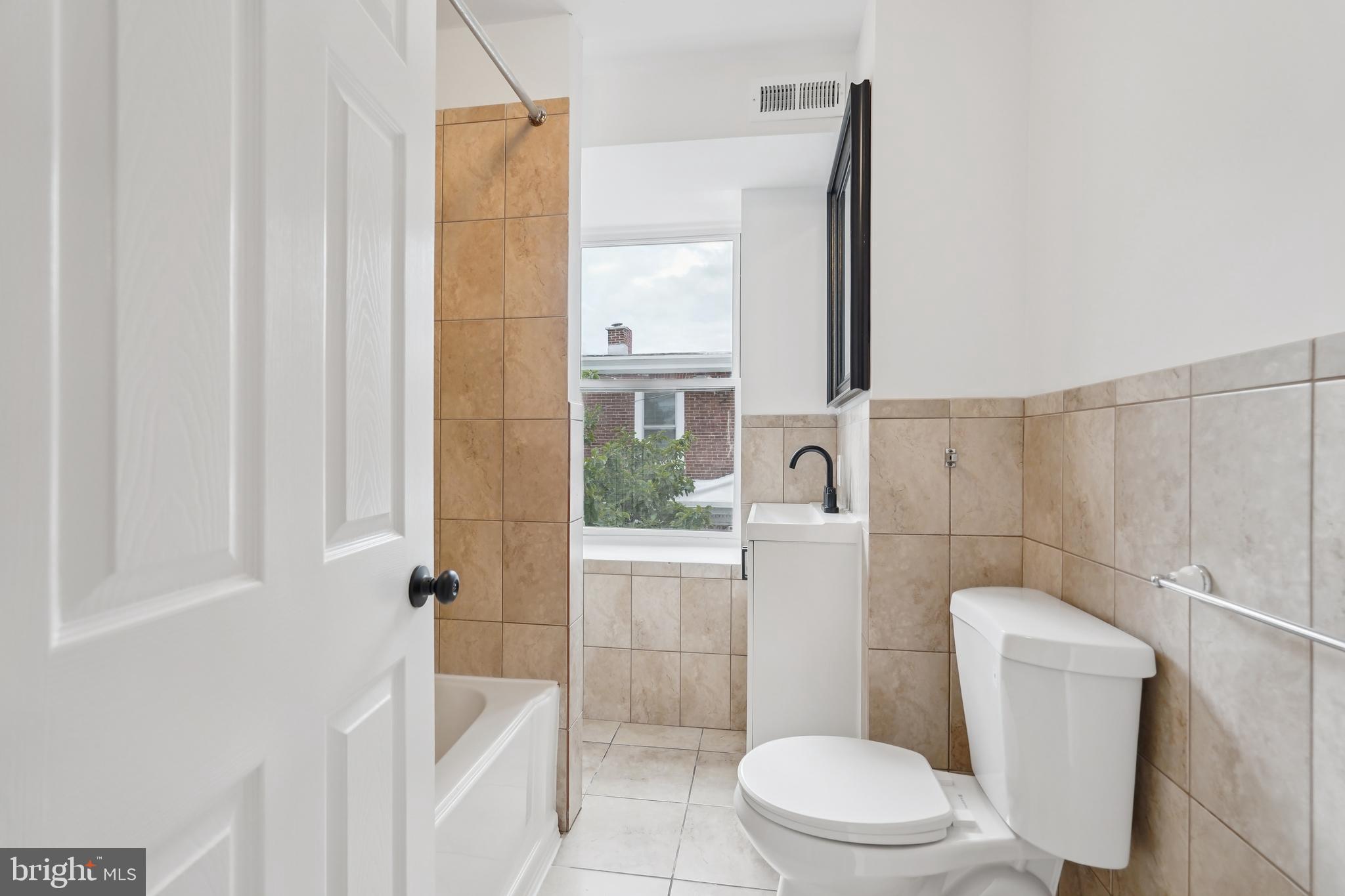 200 East Price Street Philadelphia, PA 19144 - Photo 23 of 29 a bathroom with a toilet and a shower