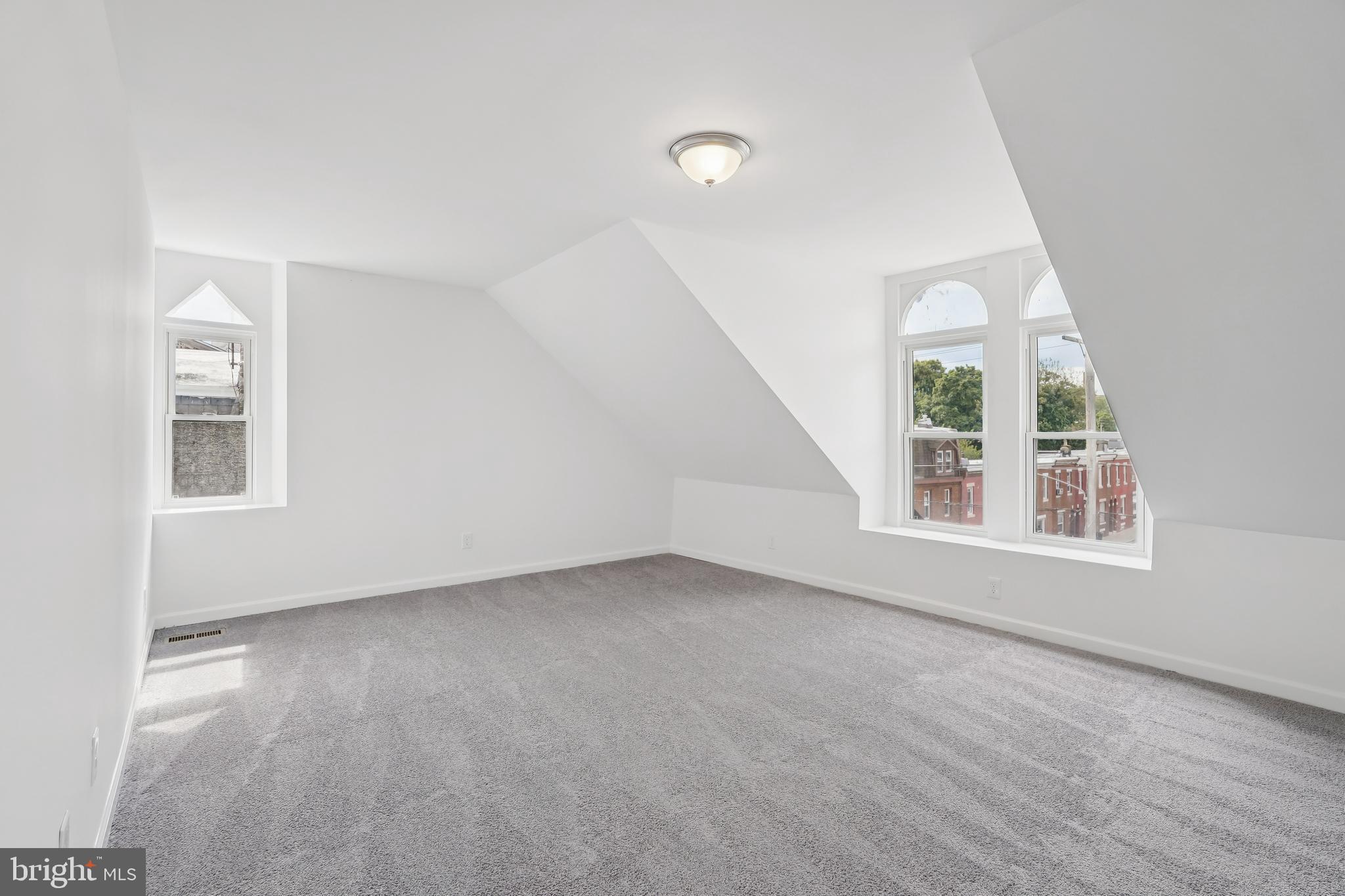 200 East Price Street Philadelphia, PA 19144 - Photo 24 of 29 an empty room with windows
