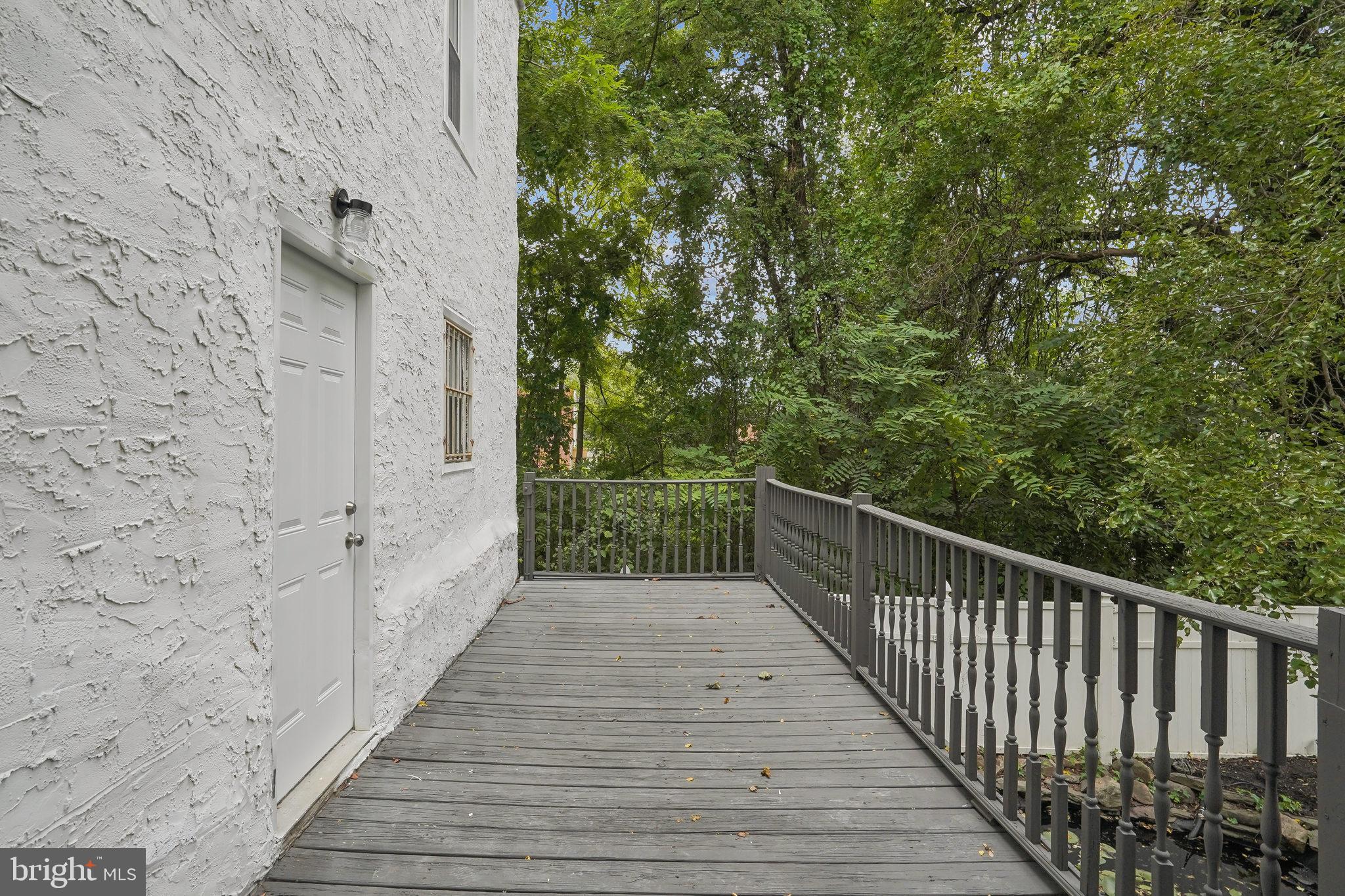 200 East Price Street Philadelphia, PA 19144 - Photo 4 of 29 a view of a balcony with wooden floor
