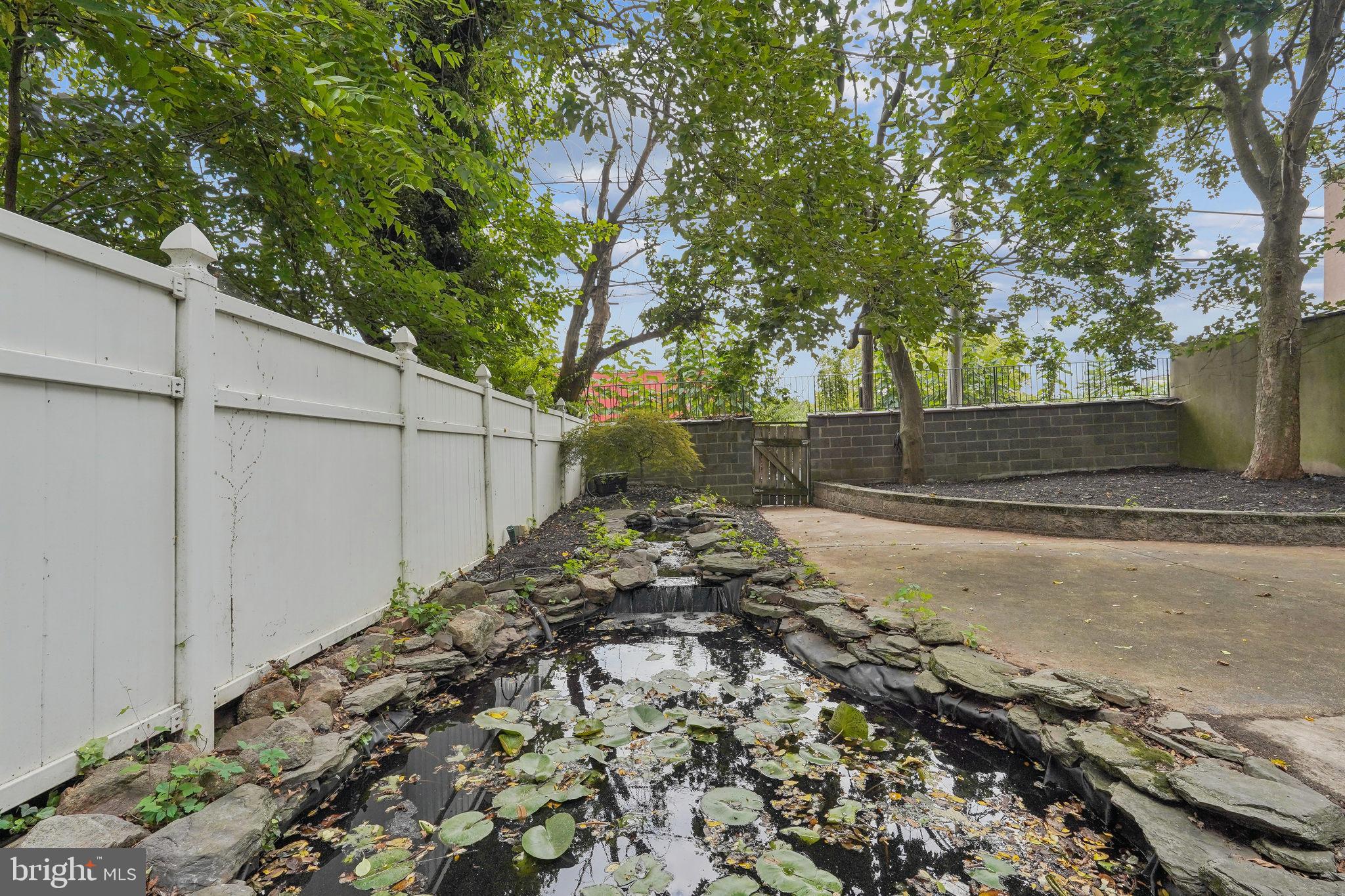 200 East Price Street Philadelphia, PA 19144 - Photo 6 of 29 a view of a backyard of the house
