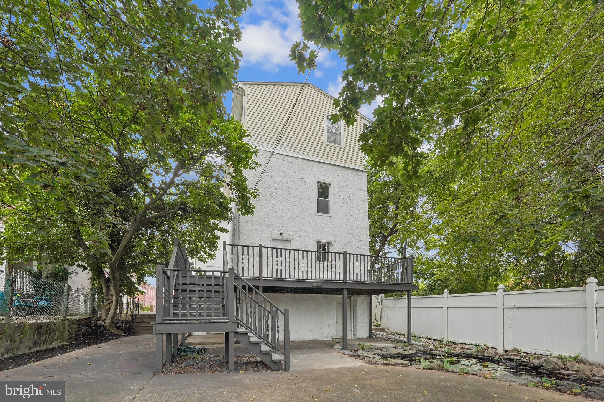200 East Price Street Philadelphia, PA 19144 - Photo 7 of 29 a view of house with backyard and seating area