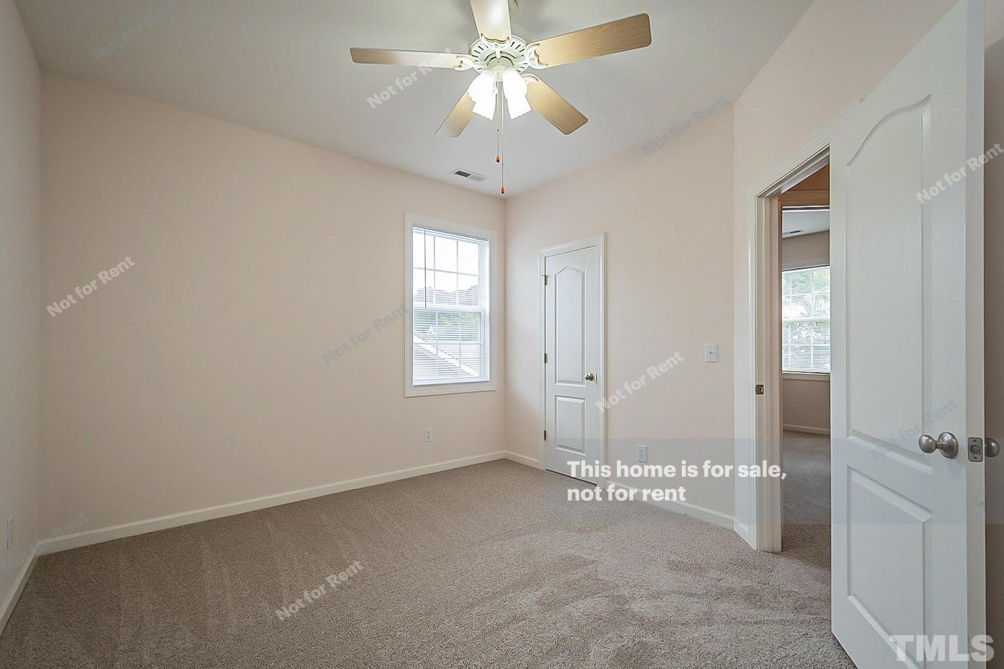 10129 Darling Street Raleigh, NC 27613 - Photo 14 of 24 a view of an empty room with a window