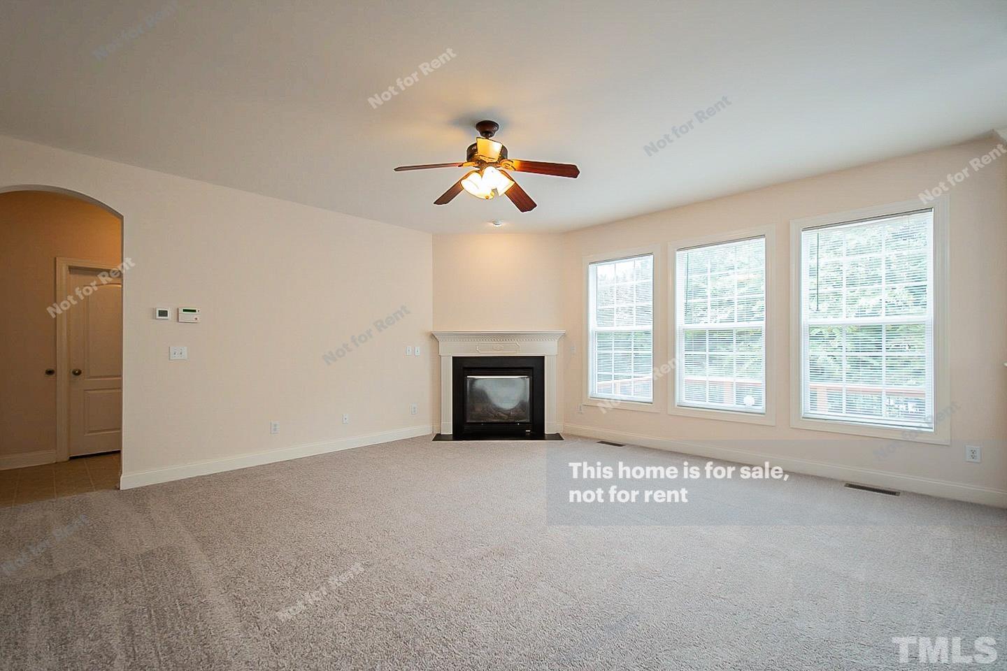 10129 Darling Street Raleigh, NC 27613 - Photo 3 of 24 a view of an empty room with a window