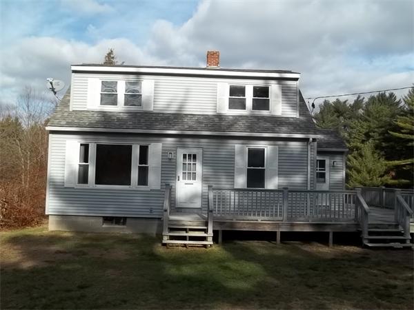 87 Howland Road Lakeville, MA 02347 - Photo 1 of 8 a front view of a house with a yard