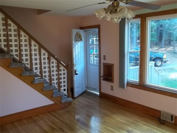 87 Howland Road Lakeville, MA 02347 - Photo 2 of 8 a view of entryway and hall with wooden floor