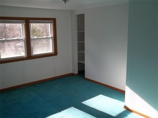 87 Howland Road Lakeville, MA 02347 - Photo 7 of 8 a view of an empty room with a window