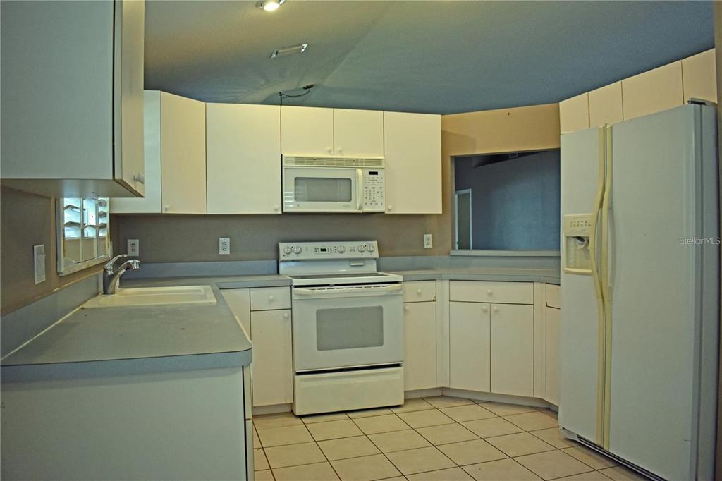14499 Tamarind Loop Spring Hill, FL 34609 - Photo 7 of 25