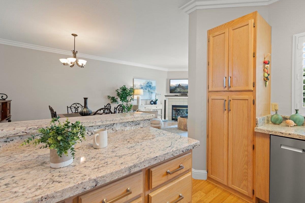 160 Troon Way Half Moon Bay, CA 94019 - Photo 11 of 28 a bathroom with a granite countertop sink and a mirror