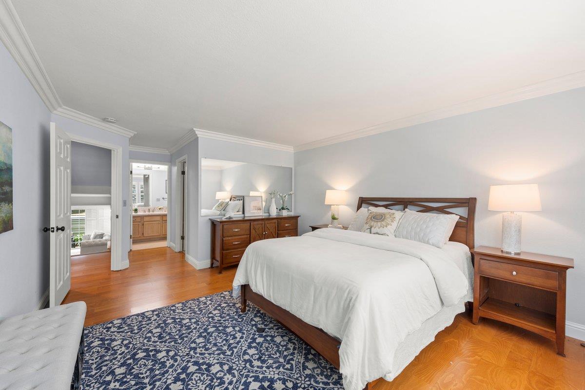 160 Troon Way Half Moon Bay, CA 94019 - Photo 14 of 28 a spacious bedroom with a bed and table