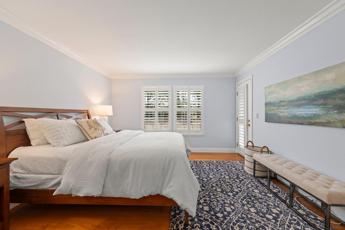 160 Troon Way Half Moon Bay, CA 94019 - Photo 15 of 28 a bedroom with a bed and a window