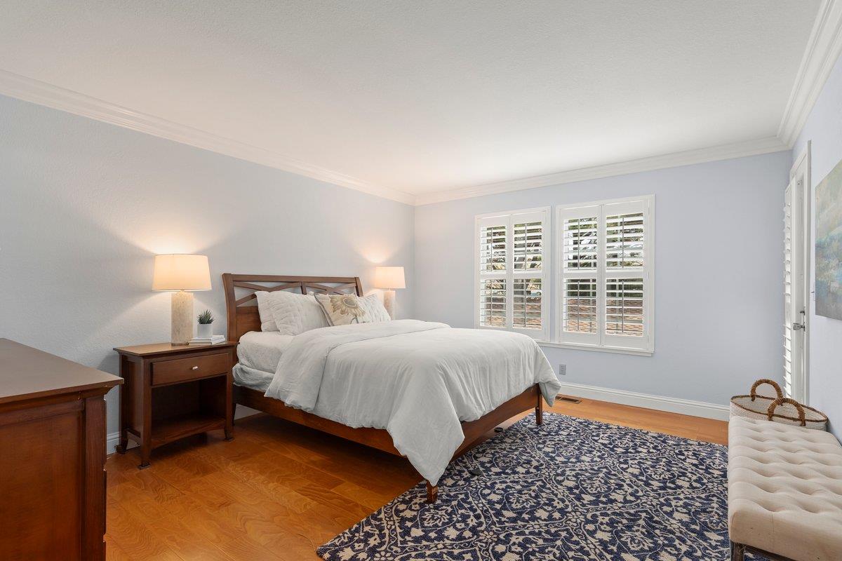 160 Troon Way Half Moon Bay, CA 94019 - Photo 16 of 28 a bedroom with a bed and a window